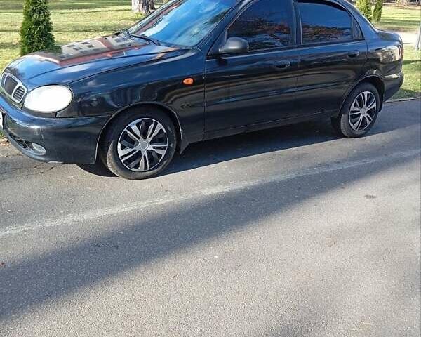 Деу Ланос 2006 у Буче на Automoto.ua Чорний Деу Ланос, об'ємом двигуна 1.5 л та пробігом 410 тис. км за 2250 $, фото 4 на Automoto.ua