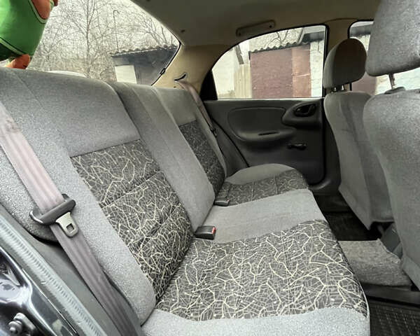 Черный Дэу Ланос, объемом двигателя 1.5 л и пробегом 140 тыс. км за 2500 $, фото 21 на Automoto.ua