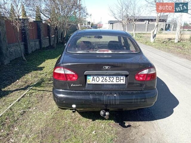 Черный Дэу Ланос, объемом двигателя 1.5 л и пробегом 250 тыс. км за 1750 $, фото 1 на Automoto.ua