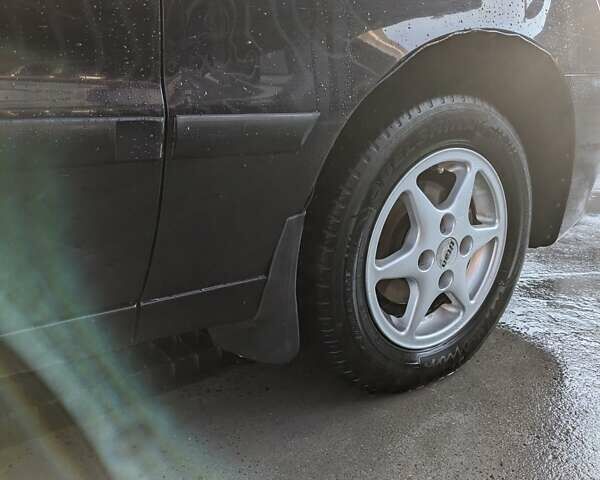 Черный Дэу Ланос, объемом двигателя 1.5 л и пробегом 170 тыс. км за 2600 $, фото 12 на Automoto.ua