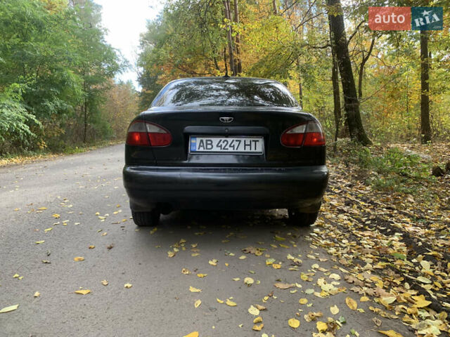 Черный Дэу Ланос, объемом двигателя 1.5 л и пробегом 290 тыс. км за 1600 $, фото 2 на Automoto.ua