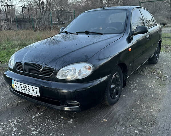 Черный Дэу Ланос, объемом двигателя 1.5 л и пробегом 270 тыс. км за 1900 $, фото 1 на Automoto.ua