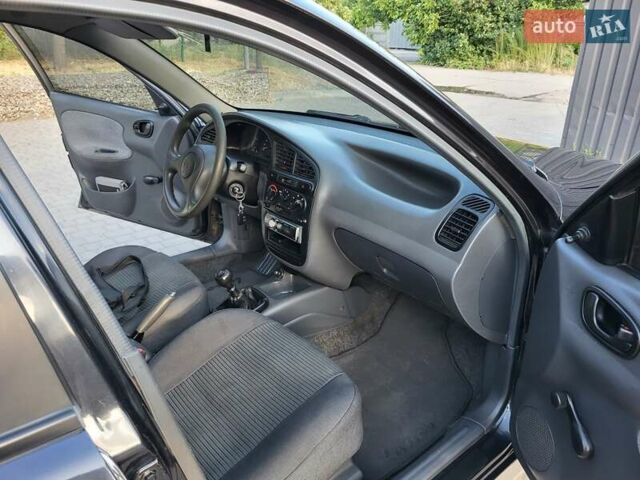 Черный Дэу Ланос, объемом двигателя 1.5 л и пробегом 215 тыс. км за 2900 $, фото 8 на Automoto.ua
