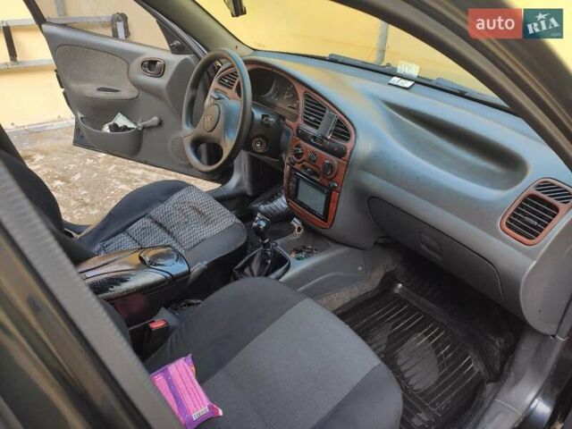 Дэу Ланос 2006 в Кривом Роге на Automoto.ua Черный Дэу Ланос, объемом двигателя 1.5 л и пробегом 273 тыс. км за 3000 $, фото 7 на Automoto.ua