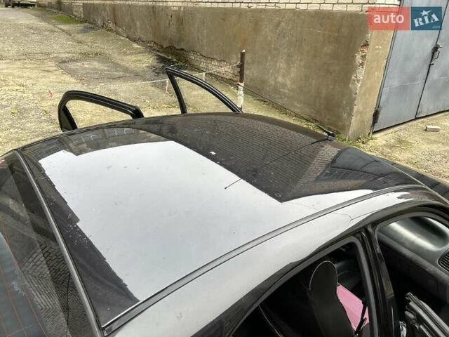 Чорний Деу Ланос, об'ємом двигуна 1.5 л та пробігом 222 тис. км за 1800 $, фото 24 на Automoto.ua