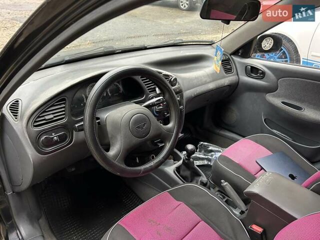 Чорний Деу Ланос, об'ємом двигуна 1.5 л та пробігом 222 тис. км за 1800 $, фото 16 на Automoto.ua