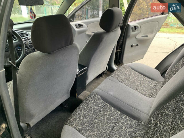 Черный Дэу Ланос, объемом двигателя 1.5 л и пробегом 263 тыс. км за 1830 $, фото 8 на Automoto.ua