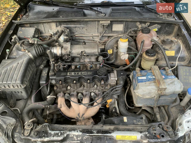 Черный Дэу Ланос, объемом двигателя 1.5 л и пробегом 290 тыс. км за 1600 $, фото 7 на Automoto.ua