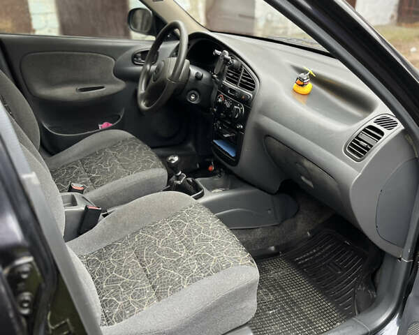 Черный Дэу Ланос, объемом двигателя 1.5 л и пробегом 140 тыс. км за 2500 $, фото 20 на Automoto.ua