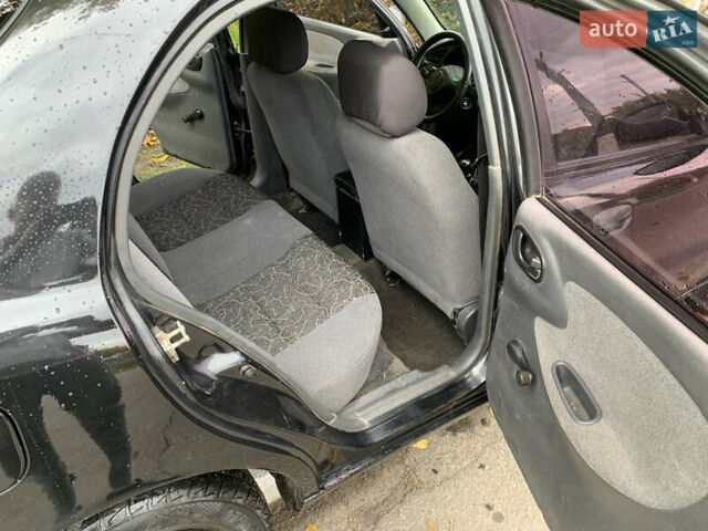 Черный Дэу Ланос, объемом двигателя 1.5 л и пробегом 263 тыс. км за 1830 $, фото 7 на Automoto.ua