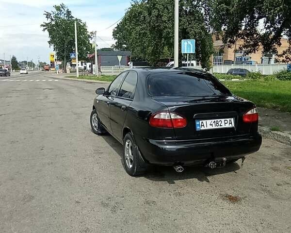 Черный Дэу Ланос, объемом двигателя 1.5 л и пробегом 202 тыс. км за 3250 $, фото 9 на Automoto.ua
