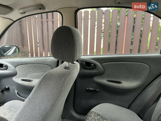 Черный Дэу Ланос, объемом двигателя 1.5 л и пробегом 140 тыс. км за 2500 $, фото 22 на Automoto.ua