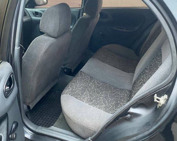 Черный Дэу Ланос, объемом двигателя 1.5 л и пробегом 231 тыс. км за 1750 $, фото 11 на Automoto.ua