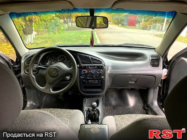 Черный Дэу Ланос, объемом двигателя 1.5 л и пробегом 256 тыс. км за 2600 $, фото 10 на Automoto.ua