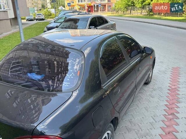 Черный Дэу Ланос, объемом двигателя 1.5 л и пробегом 240 тыс. км за 2100 $, фото 4 на Automoto.ua