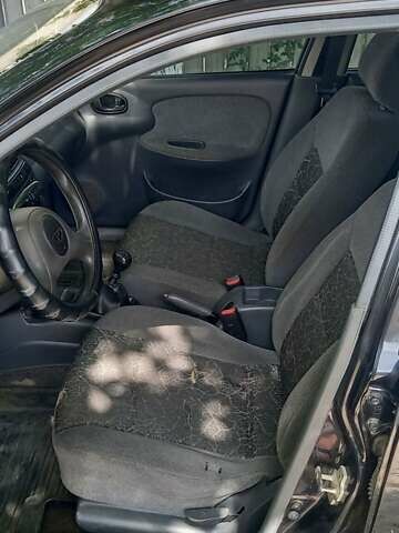 Черный Дэу Ланос, объемом двигателя 1.5 л и пробегом 328 тыс. км за 2700 $, фото 9 на Automoto.ua