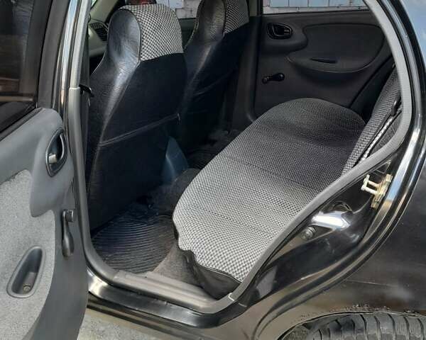 Чорний Деу Ланос, об'ємом двигуна 1.5 л та пробігом 371 тис. км за 2100 $, фото 2 на Automoto.ua