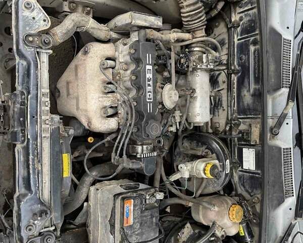 Черный Дэу Ланос, объемом двигателя 1.5 л и пробегом 100 тыс. км за 900 $, фото 22 на Automoto.ua