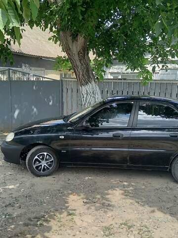 Черный Дэу Ланос, объемом двигателя 1.5 л и пробегом 328 тыс. км за 2700 $, фото 5 на Automoto.ua