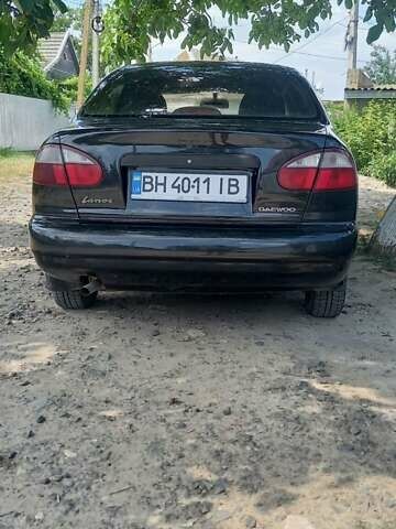 Черный Дэу Ланос, объемом двигателя 1.5 л и пробегом 328 тыс. км за 2700 $, фото 3 на Automoto.ua