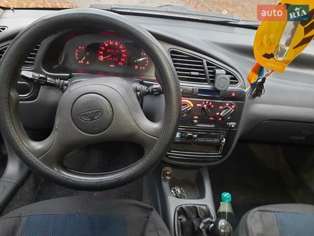 Черный Дэу Ланос, объемом двигателя 1.5 л и пробегом 208 тыс. км за 3000 $, фото 10 на Automoto.ua