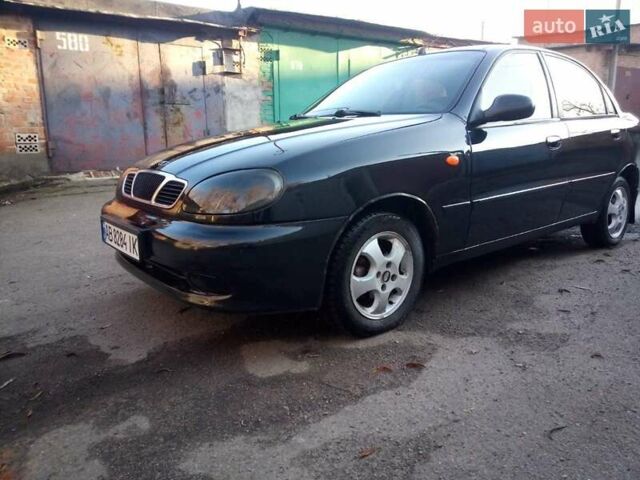 Черный Дэу Ланос, объемом двигателя 1.5 л и пробегом 231 тыс. км за 1999 $, фото 2 на Automoto.ua