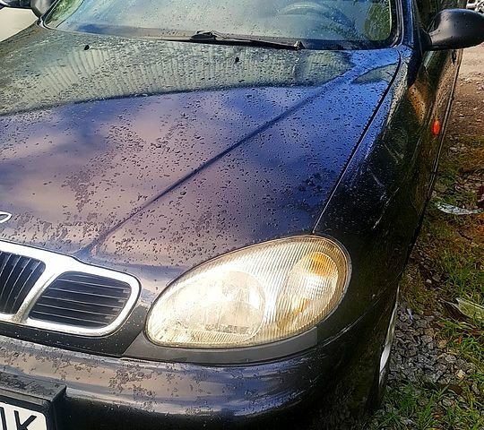 Черный Дэу Ланос, объемом двигателя 1.5 л и пробегом 230 тыс. км за 1000 $, фото 2 на Automoto.ua