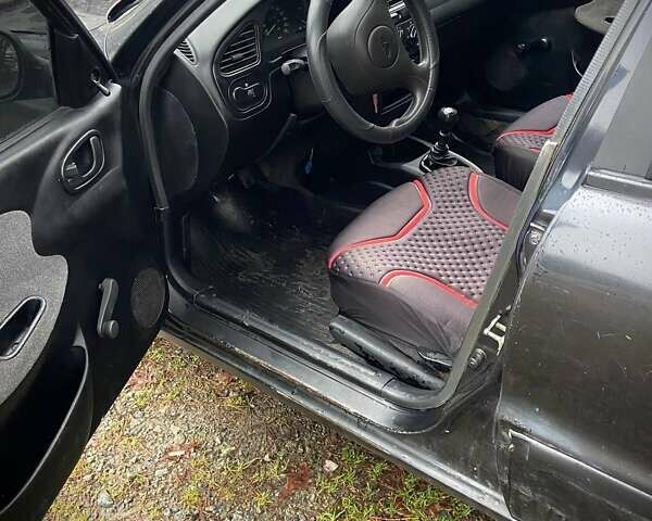 Черный Дэу Ланос, объемом двигателя 0 л и пробегом 201 тыс. км за 1500 $, фото 10 на Automoto.ua