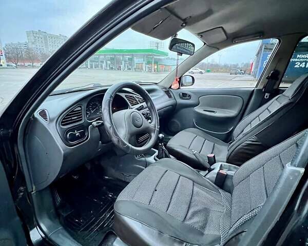 Черный Дэу Ланос, объемом двигателя 1.5 л и пробегом 653 тыс. км за 2199 $, фото 9 на Automoto.ua