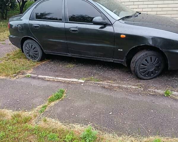 Чорний Деу Ланос, об'ємом двигуна 1.5 л та пробігом 190 тис. км за 1800 $, фото 6 на Automoto.ua
