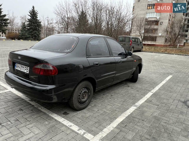 Черный Дэу Ланос, объемом двигателя 1.5 л и пробегом 286 тыс. км за 2400 $, фото 3 на Automoto.ua