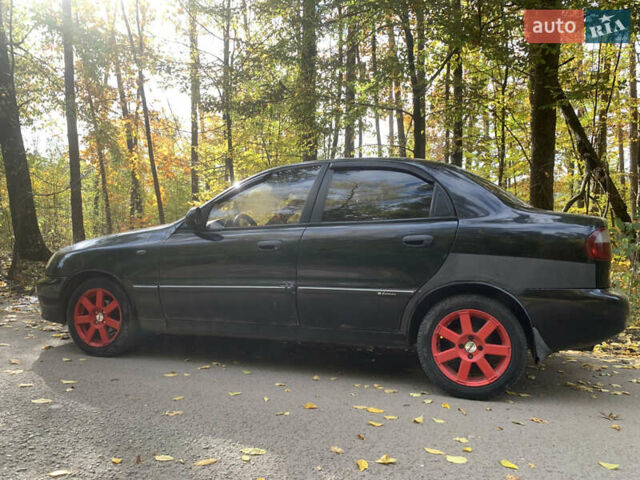 Черный Дэу Ланос, объемом двигателя 1.5 л и пробегом 290 тыс. км за 1600 $, фото 1 на Automoto.ua