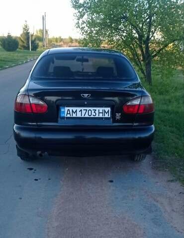 Черный Дэу Ланос, объемом двигателя 1.5 л и пробегом 248 тыс. км за 1800 $, фото 1 на Automoto.ua