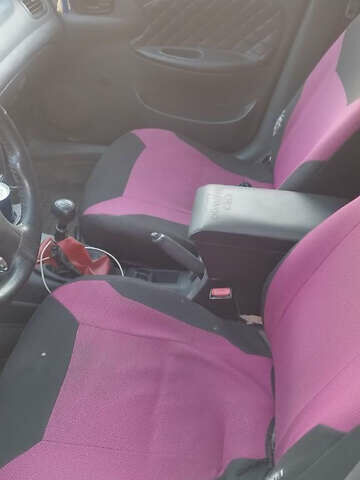 Черный Дэу Ланос, объемом двигателя 1.5 л и пробегом 147 тыс. км за 1800 $, фото 5 на Automoto.ua