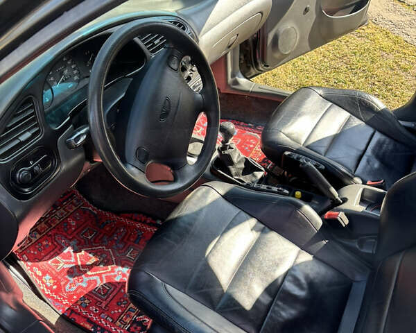 Черный Дэу Ланос, объемом двигателя 1.5 л и пробегом 241 тыс. км за 2700 $, фото 3 на Automoto.ua