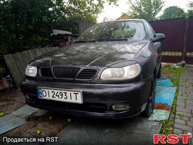 Черный Дэу Ланос, объемом двигателя 1.5 л и пробегом 274 тыс. км за 2000 $, фото 3 на Automoto.ua