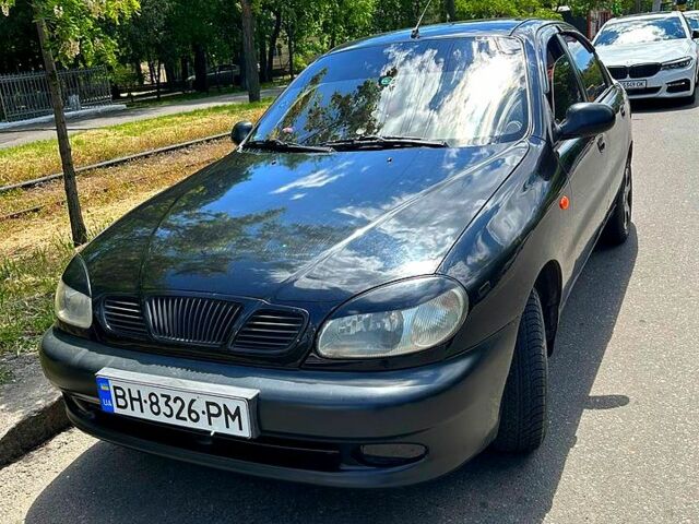 Черный Дэу Ланос, объемом двигателя 1.5 л и пробегом 123 тыс. км за 2200 $, фото 1 на Automoto.ua