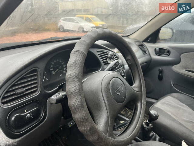 Черный Дэу Ланос, объемом двигателя 1.5 л и пробегом 296 тыс. км за 1000 $, фото 9 на Automoto.ua