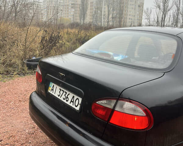 Черный Дэу Ланос, объемом двигателя 1.5 л и пробегом 298 тыс. км за 1000 $, фото 5 на Automoto.ua
