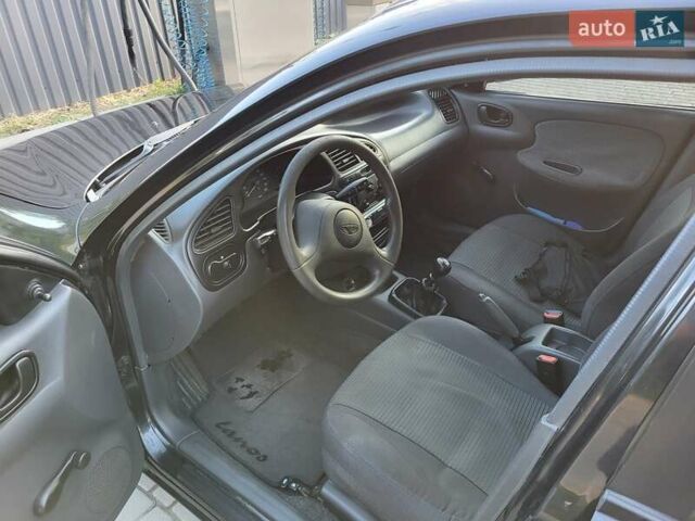 Черный Дэу Ланос, объемом двигателя 1.5 л и пробегом 215 тыс. км за 2900 $, фото 9 на Automoto.ua