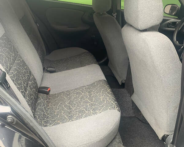 Черный Дэу Ланос, объемом двигателя 1.5 л и пробегом 179 тыс. км за 2300 $, фото 3 на Automoto.ua