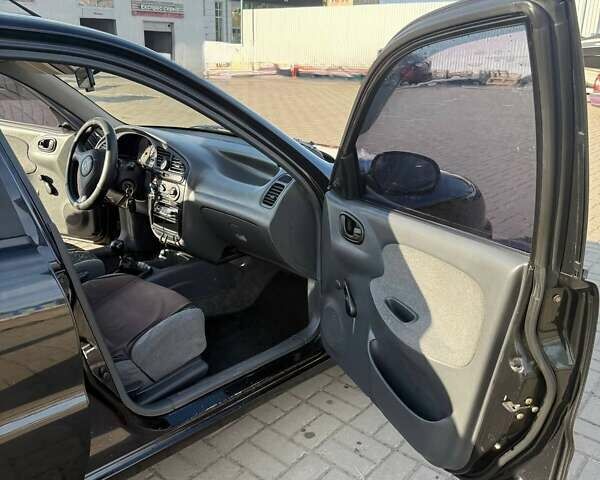 Черный Дэу Ланос, объемом двигателя 1.5 л и пробегом 163 тыс. км за 2900 $, фото 10 на Automoto.ua