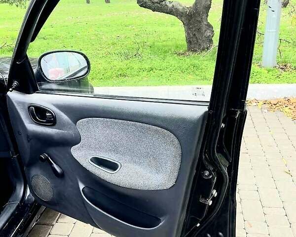 Черный Дэу Ланос, объемом двигателя 1.5 л и пробегом 160 тыс. км за 1800 $, фото 4 на Automoto.ua