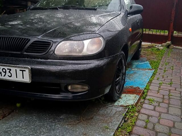 Черный Дэу Ланос, объемом двигателя 1.5 л и пробегом 274 тыс. км за 2000 $, фото 2 на Automoto.ua