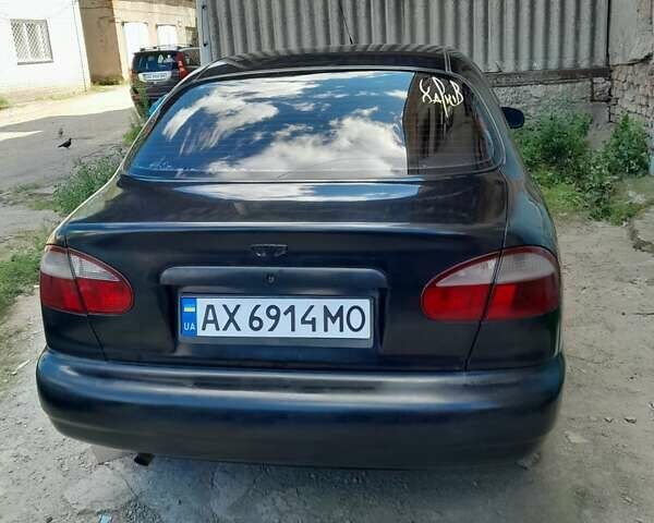 Чорний Деу Ланос, об'ємом двигуна 1.5 л та пробігом 371 тис. км за 2100 $, фото 4 на Automoto.ua