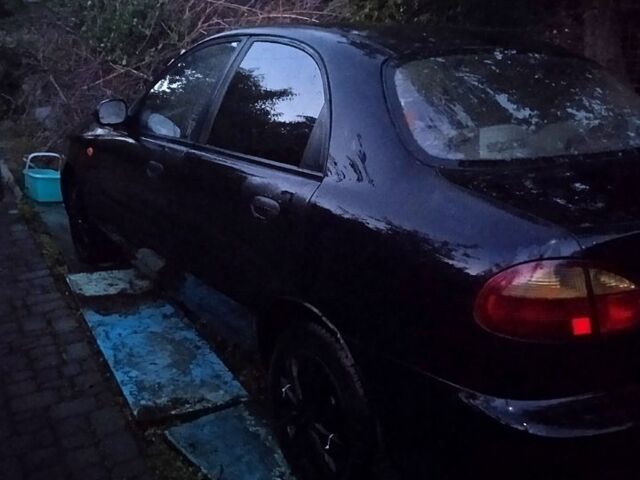 Черный Дэу Ланос, объемом двигателя 1.5 л и пробегом 274 тыс. км за 2000 $, фото 6 на Automoto.ua