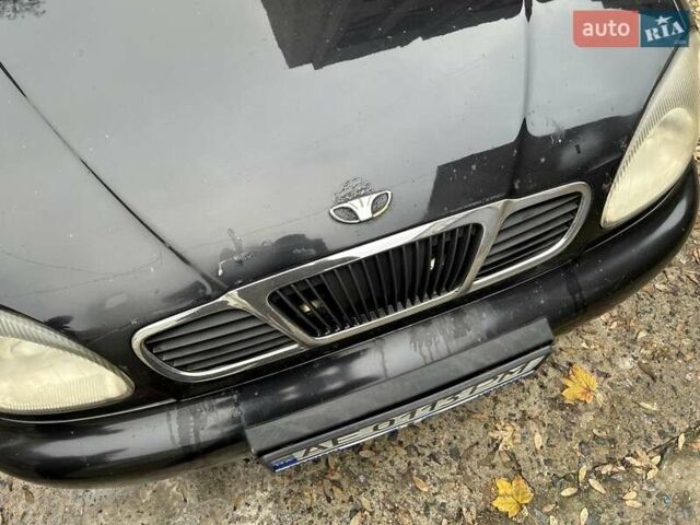 Чорний Деу Ланос, об'ємом двигуна 1.5 л та пробігом 222 тис. км за 1800 $, фото 11 на Automoto.ua