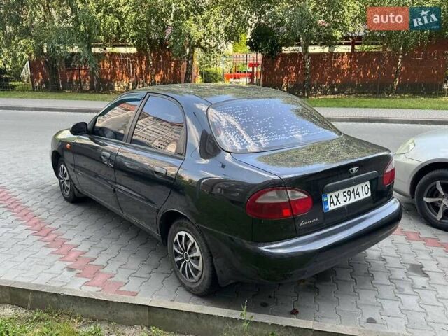 Черный Дэу Ланос, объемом двигателя 1.5 л и пробегом 240 тыс. км за 2100 $, фото 3 на Automoto.ua