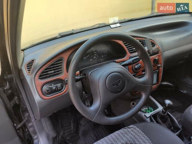 Дэу Ланос 2006 в Кривом Роге на Automoto.ua Черный Дэу Ланос, объемом двигателя 1.5 л и пробегом 273 тыс. км за 3000 $, фото 3 на Automoto.ua