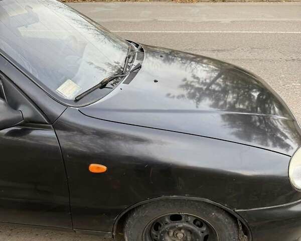 Черный Дэу Ланос, объемом двигателя 1.5 л и пробегом 100 тыс. км за 900 $, фото 15 на Automoto.ua